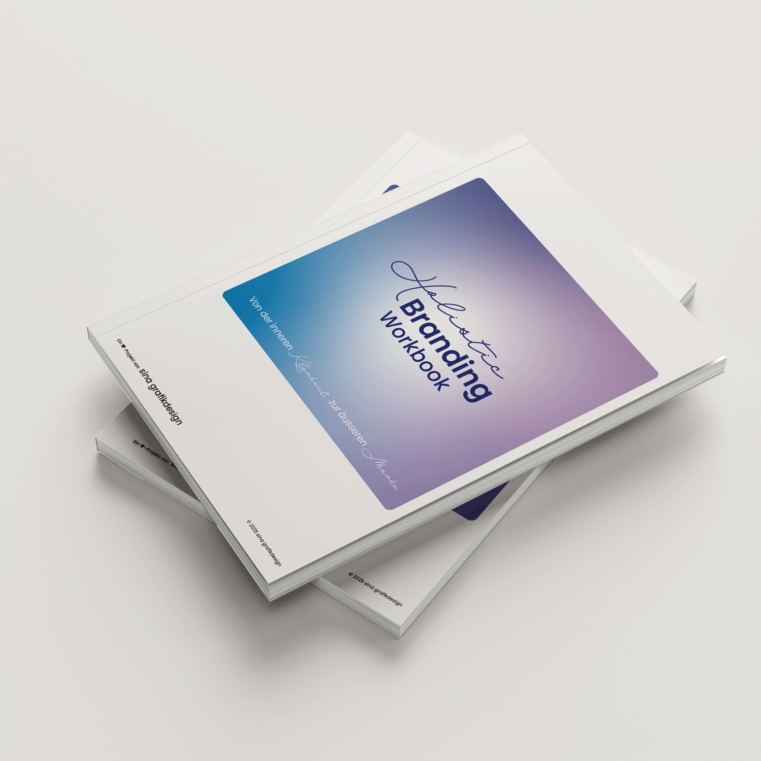 a table topped with lots of papers on top of a wooden table